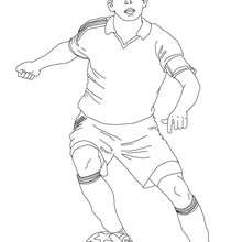 Soccer player dribbling online coloring - Coloring page - SPORT coloring pages - FIFA WORLD CUP SOCCER 2010 coloring pages - SOCCER coloring pages